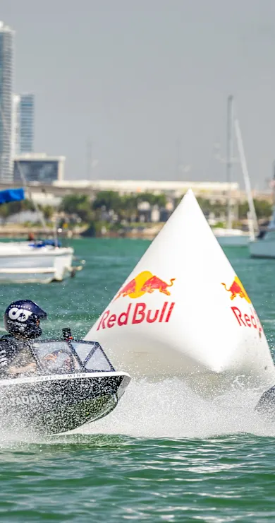 Carousel Slide Image of Ricciardo vs Tsunoda in mini jet boats