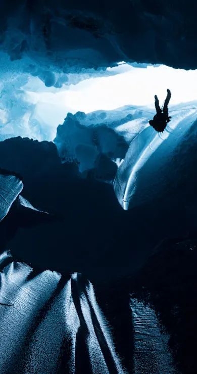 Carousel Slide Image of Will Gadd explores inside a glacier